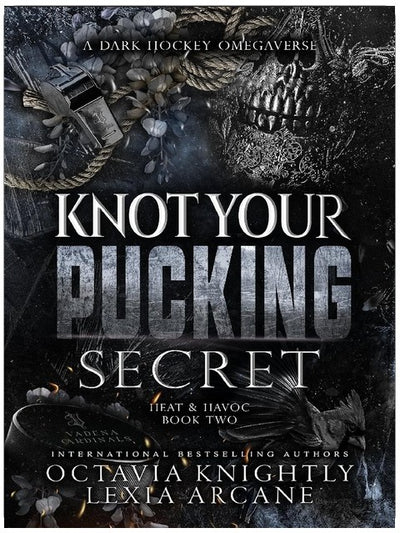 Knot Your Pucking Secret: A Dark Hockey Omegaverse (Heat & Havoc Book 2)