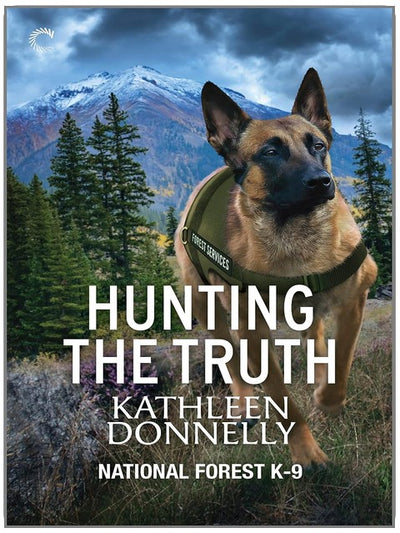 Die Jagd nach der Wahrheit: Ein romantischer Thriller über Strafverfolgung und verborgene Wahrheiten (National Forest K-9, Buch 2)
